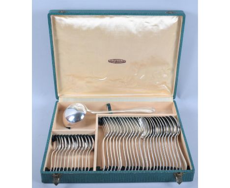 A French Art Deco Canteen Comprising Twelve Forks, Twelve Spoons, Twelve Teaspoons and a Ladle 