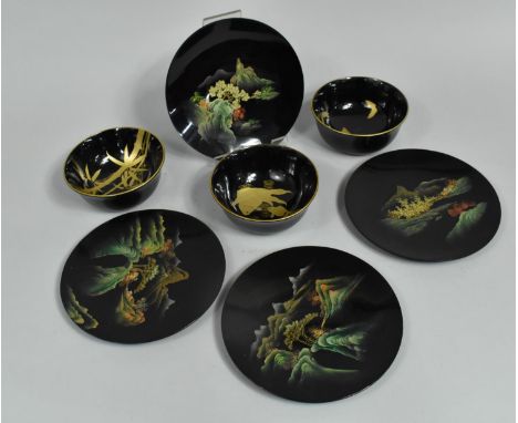A Collection of Japanese Lacquerware to Include Four Saucers and Three Bowls 