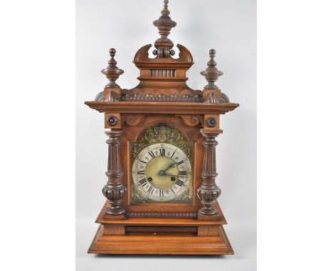 A Late Victorian/ Edwardian German Bracket Clock with Reeded Pilasters, Vase Finial and a Carved Detail, Eight Day Movement, 