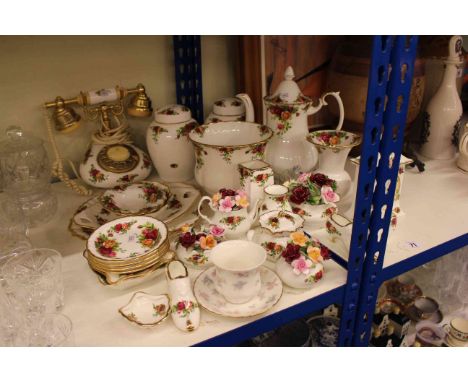 Collection of Royal Albert Old Country Roses including clock, telephone, pair jars, etc