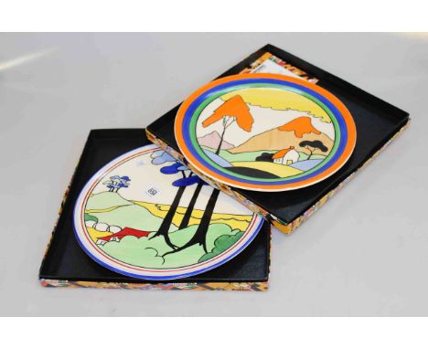 Two Wedgwood Clarice Cliff Limited Edition chargers, Biarritz plate in Honolulu and wall plaque in blue firs, both boxed