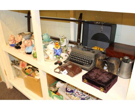 Set of five Wade Nat West pigs, ten Wedgwood collectors plates and rack, vintage typewriter, Victorian mahogany writing box, 