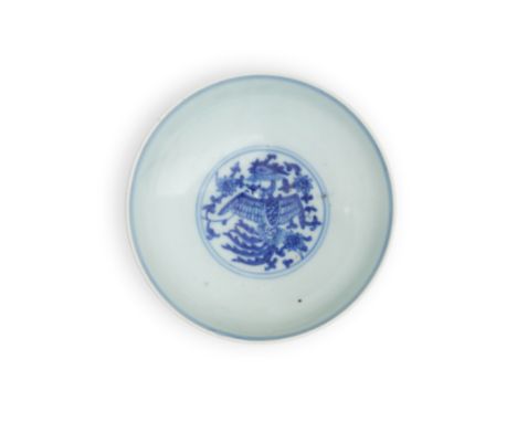 A Chinese blue and white 'phoenix and lots' shallow bowl20th century, apocryphal Longqing markPainted around the exterior wit