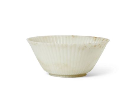 A Chinese pale jade Mughal-style 'chrysanthemum' bowl Qing dynasty, Qianlong period The bowl thinly carved with gently rounde