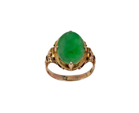 A Chinese gold and jadeite ring20th centuryThe apple green cabochon stone set on a delicately decorated gold mount, stamped '