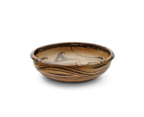 A Chinese Neolithic-style 'fishes' bowl20th centuryPainted in black to the interior with three stylised fish.28cm diameter.Th
