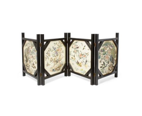 A Chinese embroidered silk 'hundred birds' four-fold table screenLate Qing dynastyComposed of four screens, each inset with a