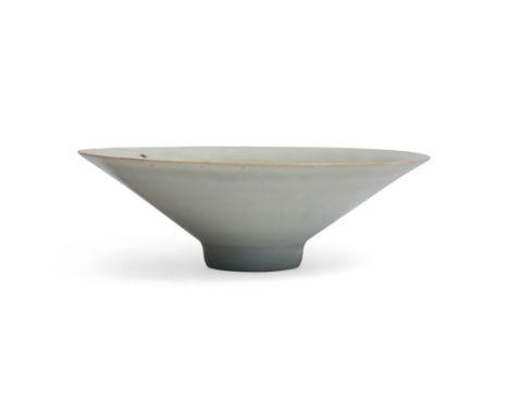 A small Chinese qingbai-glazed conical carved 'floral' bowlSouthern Song dynastyThe interior carved with bold floral scrolls,