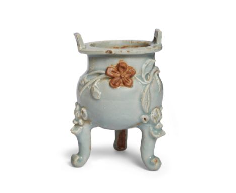 A Chinese qingbai-glazed tripod incense burner20th centuryWith applied floral decoration and carved mythical beast legs, cove