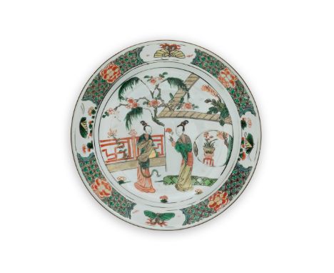 A Chinese famille verte 'ladies' dishQing dynasty, Kangxi periodEnamelled to the centre with a pair of ladies in a fenced gar