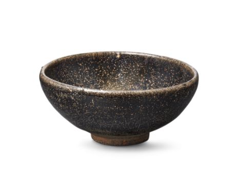 A Chinese Jianyao 'tenmoku' teabowlSong dynastyThe gently rounded shape covered overall in a lustrous black glaze covered in 
