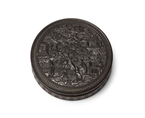 A Chinese moulded tortoiseshell circular box and coverQing dynasty, 19th centuryThe cover decorated with a busy village scene