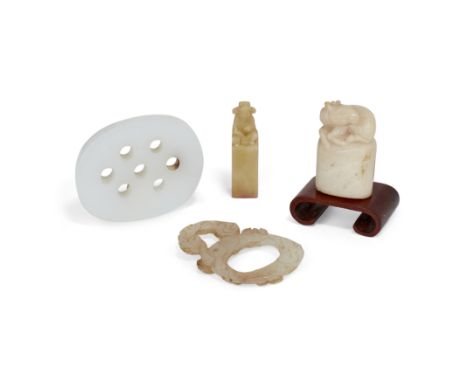 A Chinese jade carving, two soapstone seals, and a white glass pendantLate Qing dynasty/Republic periodThe white jade carved 