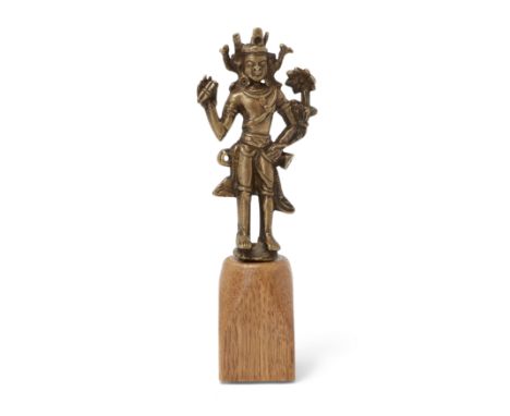 A Nepalese copper-alloy figure of Vajrapani20th centuryCast in the 9th century style as a standing Bodhisattva holding a doub