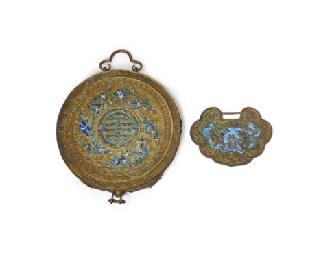 A Chinese lapis lazuli, coral and turquoise-inset gilt copper mirrorLate Qing dynastyThe frame formed as a pair of scaly drag