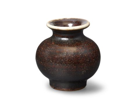 A small Chinese black-glazed jarlet20th centuryWith globular body and wide, flared mouth, covered overall in a lustrous black