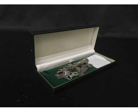 CHARM BRACELET with silver and other charms, along with a set of Princess Royale coffee cups