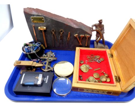 A tray containing boxed Ronson lighter, marquetry box containing buttons and badges, a piece of slate housing eight miniature