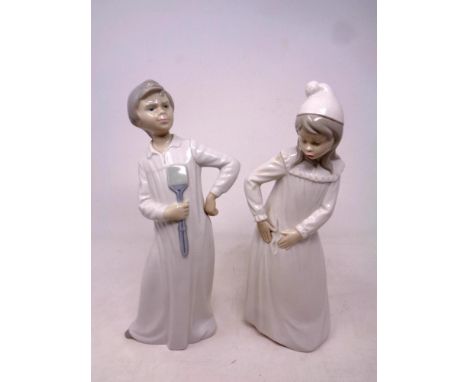 A Nao figure, boy with fly swat, together with a further Nao figure, girl in nightdress  