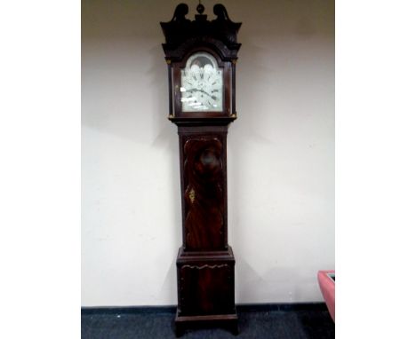 A fine 18th century longcase clock by Joshua Hewlett, Bristol. The English 8-day movement, 8-bell quarter chiming and 9th bel