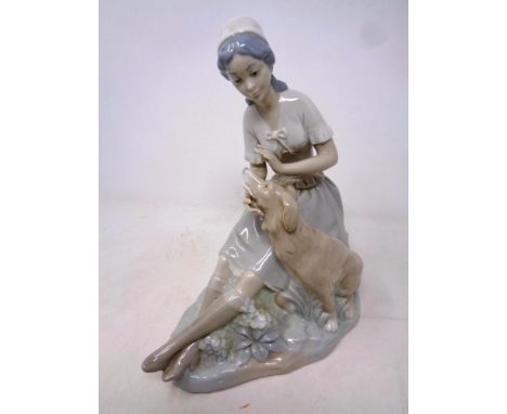 A Nao figure, Rosal girl with dog 