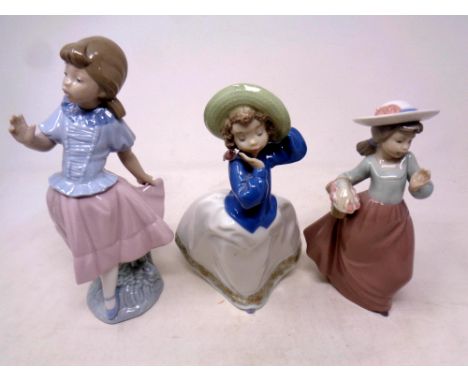 A Nao figure, girl with basket of flowers, together with two further Nao girl figures 