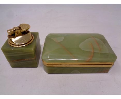 An onyx cigarette box with lighter  