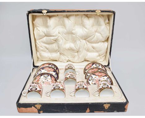 A Royal Crown Derby Imari Coffee Service, pattern number 383, boxed, together with a Derby Mustache cup and saucer pattern '1
