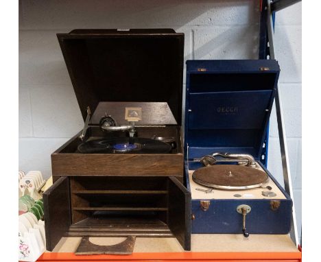 HMV Oak Table Top Gramophone and a portable gramophonemovement winds and deck revolves, brake and release lever will spring b