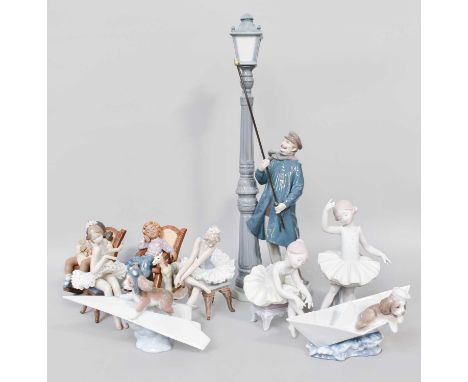 A Selection of Lladro Figures, comprising: a Street Lamp Lighter, pair of children in rocking chairs numbered 2322 and 2321, 