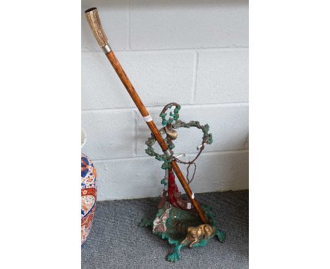 A Victorian Painted Cast Metal Stick Stand, together with an antler handled cane (2)