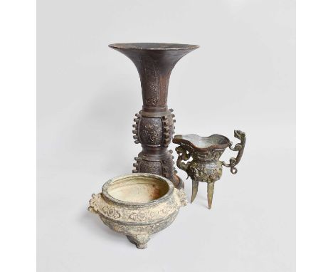 A Chinese Bronze Gu Shaped Vase, in archaistic style, 25.5cm high, together with a similar tripod ewer with mythical beast ha