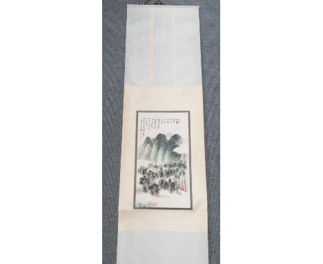 A 20th Century Chinese Watercolour Scroll Painting, depicting a mountain scene with calligraphyNumerous creases to the silk b