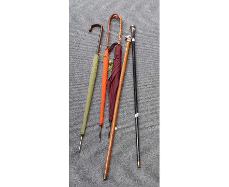 Two Fox &amp; Co. 'Paragon' Parasols, one green the other orange, a further parasol, a silver topped ebonised cane and a furt