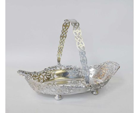 An Edward VII Silver Basket, by William Hutton and Sons Ltd., Sheffield, 1903, oval and on four bun feet, the sides pierced w
