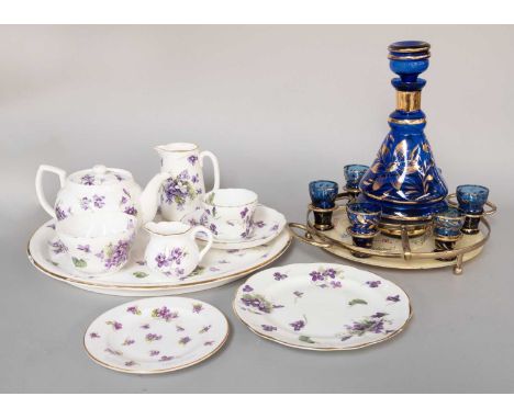 A Hammersley &amp; Co., China Tete a Tete, painted with purple flowers, together with a three piece Noritake tea set, a Victo