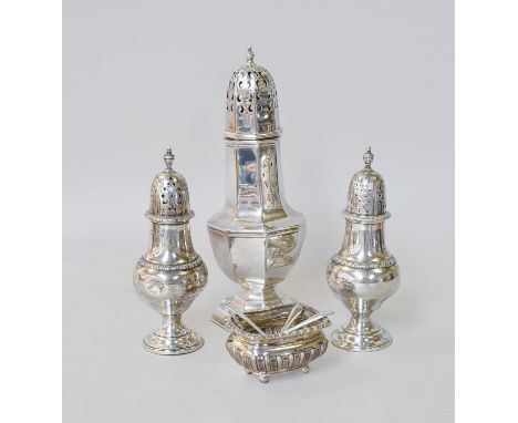 A Collection of Assorted Silver Condiment-Items, comprising an octagonal caster, London, 1907, 21cm high; a pair of pepperett