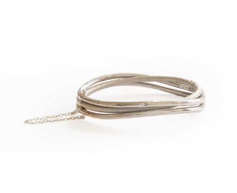 A 9 Carat White Gold Bangle, inner measurements 6.3cm by 5.5cm (a.f.)Gross weight 10.5 grams.