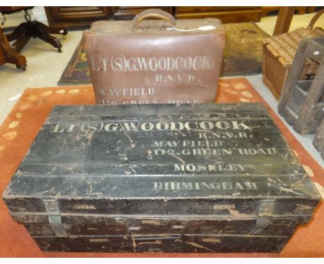 A black painted military trunk inscribed "Lt (S) G. Woodcock R.N.V.R. .... Birmingham", together with a brown wrexine style s