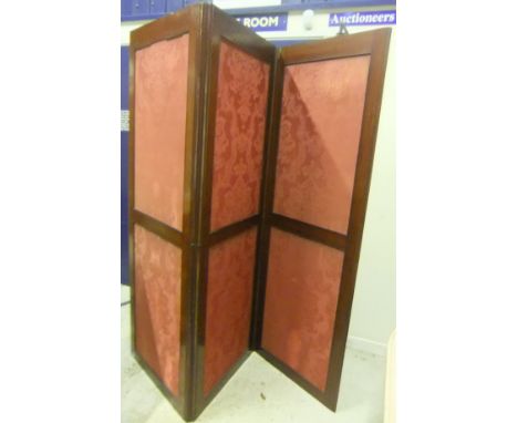 A Victorian mahogany framed three-fold vanity screen with plush pink self patterned upholstered screens  CONDITION REPORTS Ea