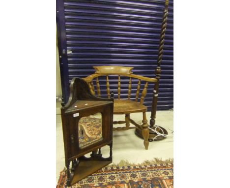 A beech captain's chair, two mahogany wall hanging corner cabinets with mirrored doors, an oak standard lamp and an oak fire 