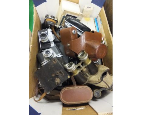 A box of vintage cameras to include a Brownie 127, a No. 2 box camera, a Rolleicord, a pair of vintage binoculars, a Boots Am