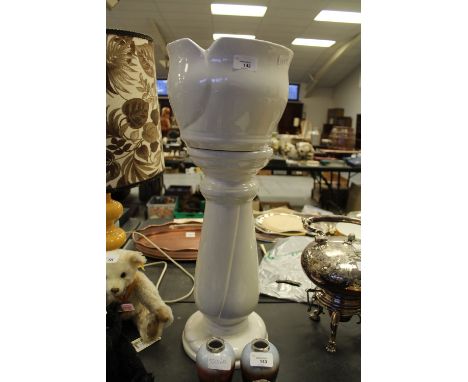 White ceramic jardiniere and pedestal