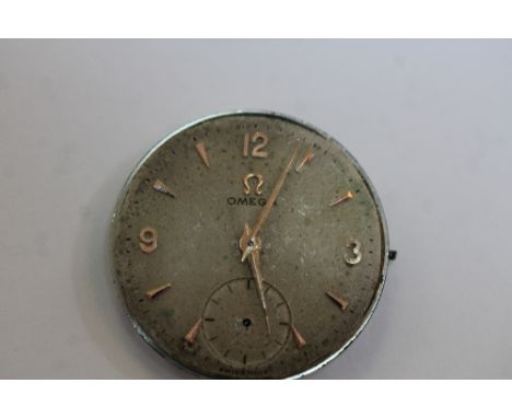 Vintage gents Omega wristwatch movement, with silvered dial and seconds dial, No. 12202185, (lacking crown and seconds hand)