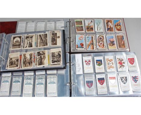Three albums of cigarette cards. Depictions in first album including First Aid Guidance, Art Treasures, by makers including W