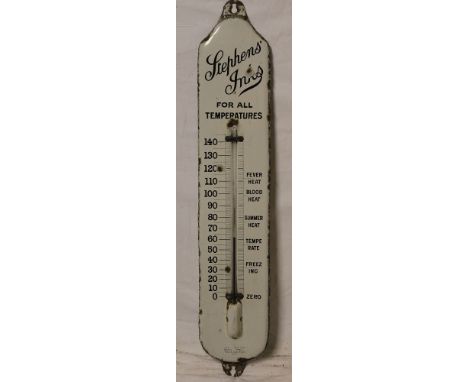 A shaped-rectangular enamel advertising sign with inset thermometer "Stephen's Inks - For All Temperatures", 37" x 7" overall