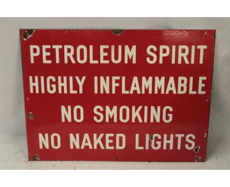 An enamel rectangular garage fore court sign "Petroleum Spirit Highly Inflammable No Smoking No Naked Lights", 18" x 24"