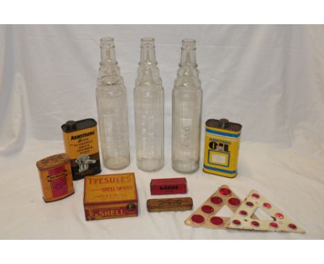 Three various vintage Esso/Esso Lube glass oil bottles, Dunlop Major Tube Repair tin, various other motoring tins, etc