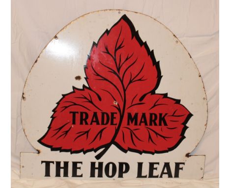 An enamel arched advertising sign "The Hop Leaf Trademark", 30" x 31"