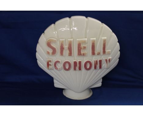 An opaque glass scallop-shaped petrol pump globe "Shell Economy", 17" high, (faint traces of maker's marking)